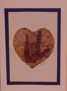 "I Love You" greeting card created using  maple and redbud leaves.